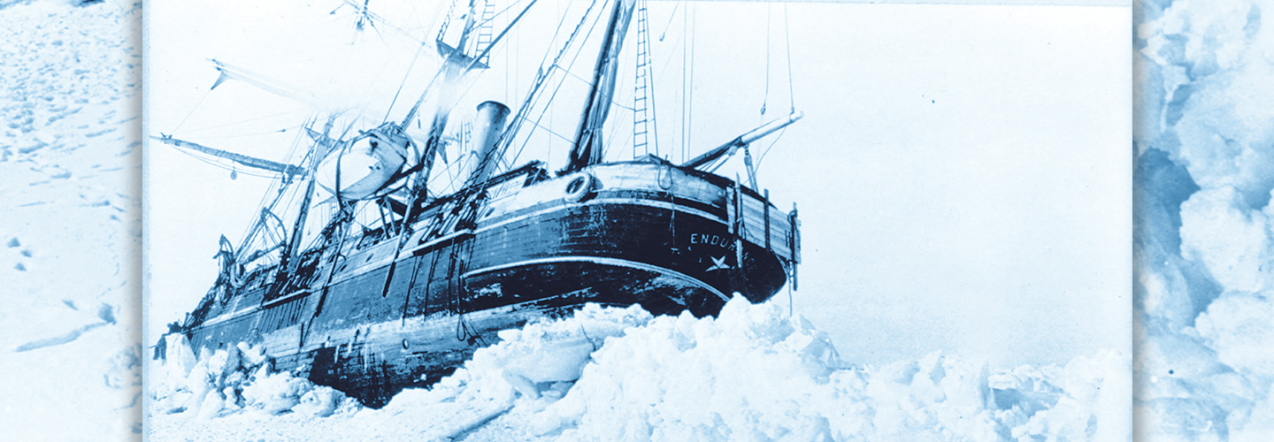 Image of a large ship pushing through ice